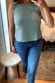 Love the open back detail. The material is soft and the color is beautiful and perfect to pair with white jeans/shorts in the summer! Since the back ties, it's easily adjustable for those with larger chests. - Adena B.