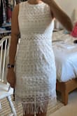 I ordered this dress as an option for my ZOOM wedding this summer (yay, COVID) and I loved the look. The lace was really pretty in person and the fringe didn't stick out or tangle as I expected. However, it was way too big. I would have ordered it two sizes down if I could, but this is the smallest size it comes in. 
I've bought XS from lulus before so I was surprised when this dress was so baggy and not form-fitting like the picture.  Sadly, had to return it :( - Roxana M.