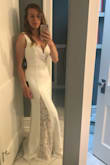 I love the style of this dress. I tried this dress on in two sizes (S and XS) as something to wear for what would have been my September wedding, but will now likely just be a small ceremony with our immediate families. The S fit better than the XS, especially in the bust area. After trying it on, I liked this dress, but I did not love it enough not to keep looking. The dress is lined and well-made, but the fabric is about the quality that you would expect for $80. The top has a wire in it, so it may lay oddly/gap if you do not have a larger cup size. The zipper in the back also slightly poufs out, but this was not terrible. Finally, the dress is very form-fitting, so if you're not comfortable with a skin-tight dress, this may not be the one for you. - Julie C.