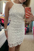 This is the first time that I ordered a clothing item online so I was really nervous, especially a dress because all dresses fit me differently. This dress was so amazing. It fit very well. I decided to order an extra small and a small just in case. I chose the extra small and returned the other size FOR FREE! It arrived sooner than expected which was great as well. If you are in between two sizes, I suggest ordering the smaller one or doing what I did because this dress is a little big on the chest area but I can't blame it because I have small boobs. - McKala S.