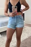 These shorts actually cover your butt cheeks which is hard to find these days. They have minimal stretch. I'm usually a 25 or 26 and a small fit perfectly. I wish they were a little bit higher waisted but I like them and will be wearing them a lot this summer. - Joanna F.
