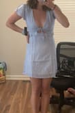 I'm absolutely obsessed with this dress! Pretty open and low cut in the chest area but it's sooo flattering and slim fitting - Stephanie C.