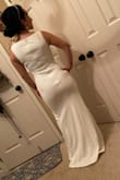 I found this very cheap dress to do a bridal photo shoot because I couldn't have a wedding party but still got married. The fabric is nice and thick, when I took this picture I was wearing a very dark color bottom underwear and you can't really see it. It's beautiful, simple and perfect.
PS. It looks a little long on me even with very high heels but I'm very short - Gabriela H.