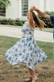 LOOOOOVE this dress! It fits be perfectly especially around the waist. It's nice and light and flowy but also has a slip underneath! I used it for my engagement photos! - Colleen M.