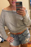 This thing is super soft and so comfy!  The shoulder can be worn a couple different ways...   also I tied it up in back sometimes to make it a crop top.  It's cute either way.  Can't wrong with this.  I bought a medium.  I'm 5'5 and 132 pounds. I do have a pretty big chest though.  So take that into account when ordering yours. - Amy H.