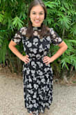 I can't believe I waited this long to finally go for this dress, it is simply stunning! I am a size 4-6 (how my body size fluctuates throughout the year), and the MEDIUM fits amazingly! I have plenty of room to breathe, as the waist is stretchy, but I definitely would not go down a size. The pattern is beautiful and the overall look is classy. One thing to note is that the thinner shoulder fabric is see-through, so bra straps will be visible. 10/10 for this dress! - Sarah G.