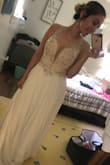 This dress is so beautiful!
I was a bit nervous purchasing offline but so glad I did! 
I'm super short so I will be getting it hemmed other then that it first perfect! - Mina B.