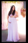 Omg this is a beautiful dress. I got for  my Babyshower and maternity photoshoot.  I fit so well, was a little long and runs a little big too, so was perfect for my occasion... I was 9 months pregnant in this pics. - Yashasvini B.