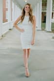 I absolutely loved this dress. The material was perfect and fit so nicely. The back is so sexy and the front is very appropriate and professional. It is long enough to be professional as well. Goes great with nude heels and small jewelry assets. Loved loved loved it!!!!! - Kelsey T.