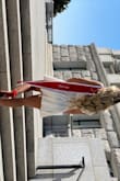 I bought this dress because I was looking for a white dress to use for my college graduation photos. I bought a size medium and it was true to size and fit nicely. A little big in the chest but I have small boobs. - Sydney M.