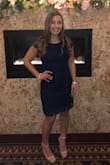 This dress fit very nicely on me and didn't go too low as I am 5 feet tall. It is perfect for a formal setting! - Erica F.
