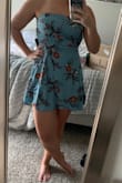 This dress is super cute the only downside I found was that there was a little more extra space than anticipated in the bust. Not very surprising since I'm kind of flat chested. Overall the fit and length were great. The arm bands weren't overly tight but in my opinion they didn't look great on me so I actually tucked them in by my armpits and made it into a strapless and liked it even better. - Caitlin M.