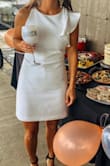 Dress fit true to size, very comfortable, I had lots of compliments! - Chondra U.