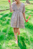 Love this dress! It's a little loose for my preferences (very much babydoll style) but I wouldn't size down bc the length is perfect. - Jane G.