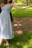 Super cute! The ruched part is stretchy and the rest of the dress is perfectly flowy. Only complaint is that it wrinkles easily - Jane G.