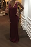 I really like this dress and how comfortable the material is. My only complaint is that it is a bit long, even with heels on my dress touched the ground. - Tianna