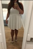 I thought this would be more fitted in the waist, and the straps don't line up with a standard bra properly. It's also loose in the top - and I wear a 38 G cup. I think I'll take it to a seamstress and have the straps changed but I was a little let down by this dress compared to the others I ordered. - Carla N.