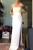 The dress is very pretty and very flattering, the lace is subtle enough but very elegant. Good material, however, Good luck getting in it alone, you need to have someone help you get into this dress. The back lacing is a pain if you don't have help as well (refer to backside photo- I gave up). Recommend having someone there when you try this number on. - Allison B.