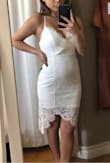 I'm 5'0 and about 100 lbs. The dress is definitely tight fitting, but is flattering! I ordered the size small as well, but it was a pretty big difference in sizing, so I stuck with the XS. It was somewhat difficult to sit in, but after trying it on multiple times, I think the material starts to become more fitting. - Anna M.
