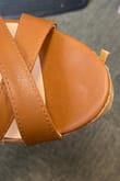 These shoes fit and feel great! Sadly, the cork paper began to peel off the front of the shoe on day one after just sitting at my desk all day. The second day I wore them I noticed the cork paper beginning to peel off the sides and back as well. The buckle is very flimsy. I'm afraid I won't be able to wear them for very long.
I'm super disappointed in myself for not noticing that were non-returnable before placing my order. - Lisa C.