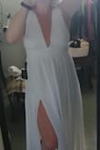 The quality of the dress was better than I had expected. Very happy with the dress. I am going to tailor it to suit me personally for a wedding dress! 
I followed the size chart and the dress fit nicely. I wanted some room for alterations, so I ordered a size up as well. - Ashley C.