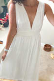 Definitely will need to get it hemmed and probably could have sized down, but this is still a great dress that will be fun to wear for a bridal event but also re used and dressed down for other occasions. - Melissa I.
