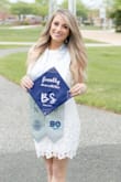 Loved this dress for graduation photos! It fit perfectly (bought an x-small). There is also a bit of stretch to the material. - Corinne S.