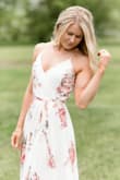 I wore this dress for my engagement photos and couldn't have picked anything better. It was so well made, fits true to size and the tie at the waist was so flattering. Definitely recommend! - Caitlin L.