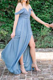 I love the dress! It's so fun and flirty while classy at the same time! My figure is small on the top and medium on the bottom. When buying fitted dresses, I usually opt for a Medium. However, if i were to buy this dress again, I would choose a Small to better fit my top half because the bottom half of this dress is loose and flowy enough that I think it would work well enough with my figure. Short ladies, beware! This dress is LONG. I'm 5'9" and wore 3-4" heels and the dress still touched the ground. Tall ladies, this dress will look divine on you! - Jade B.