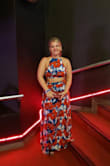 I bought this dress last year for a beach vacation and it was simply BEAUTIFUL!!  I bought the Large because I've been blessed with abundant hips (thanks, Ma!), so I typically size up to account for that, but I honestly could've gotten away with a Medium.
WARNING for us "vertically challenged" (short) girls, I DID have to have an emergency alteration done because I was tripping over it, though!  Even with my 3" wedges that I wore with it, I was constantly stepping on it and pulling it down.  Thankfully I had an alteration shop that could handle the last-minute hemming for me.
Otherwise, this is WONDERFUL!  (As are most of the many items I order from this site :) ) - TARA Z.