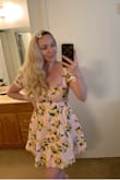 Love this dress! It's very bright and colorful. Perfect for summer and a photo shoot! I wore it for Mother's Day And it made me feel pretty. It fits true to size and has a lot of fabric in the skirt which is nice but is very low cut on the neck line but I expected that. I am a Double D and I couldn't wear a bra with it. Love Lulus! - Janis M.