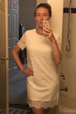 I loved the lacy fabric of this dress---it is beautiful. I ultimately didn't find the sheaf style to be the most flattering on me, since it hugged my hips, but then was very baggy on my waist. The zipper bunched a bit in the back, but otherwise, the dress fit true to size. - Julie C.