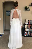 I tried this dress on as a possibility for my wedding ceremony. The back of the dress is gorgeous, but I was less excited about the front. The sides of the dress gapped underneath my armpits and while this isn't necessarily a downside if you are looking for this, the lacy sleeves are looser. The skirt felt well-made, though and the waist area fit perfectly. The lace has a beautiful pattern. - Julie C.