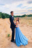 The dress is absolutely beautiful. Perfect for any occasion, and super light and flowy. I'm short, so with heels the dress was still a bit long, but pictures turned out wonderful for my "senior ball." - Kandace