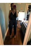 This is great!! I have a smaller top half and bigger bottom half so finding rompers that fit is a challenge. Not anymore! The material is lighter then I was expecting, a little thing but breathable with some stretch. The adjustable halter is great with the low neck line. I normally safety pin the front with this style however there is enough fabric in the overlap that a safety pin is not required.. so happy!! My only issue is with the length, it's a bit long for me. The ankles are bit baggy but the elastic is helpful, might just tuck it under next time. Overall this romper fits and feels great!! - Sarah N.