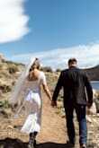 I wore this dress for my Colorado Elopement to Twin Lakes. I wanted to wear something that showed off my vintage cowboy boots. The lace was so elegant and it hugged in all the right places. I glued in bra pads so I didn't have to wear a bra and added a belt to spruce it up I got off Amazon. For under $100 you can't beat it! - Libby P.