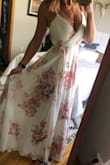 I had high expectations, and this dress met them! It is so beautiful. If you love wrap dresses, this is a great one. I am really happy with the length, sizing, and even pleased with how the florals were pieced together in its construction. My only minor complaint is that I don't know what I'll do in the bust area. The snap is very weak and does not stay closed, so I'll probably have to remove it and use tape. Still worth keeping. (Pic is straight out of the package.) - Sarah L.