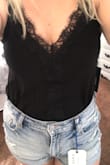 This is my second one of these bodysuits I love them so much! Loose and casual or able to be dressed up. Soft and flowy and true to size. Stretchy long material.
*Update - after my first time actually wearing this out I realized how poor quality it is. I hadn't even snagged it on anything and it just ripped a hole in the side. The fabric is very thin and apparently not very sturdy. - Madchen Z.