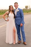 I wore this to prom and received so many compliments! I had to hem the bottom and close the top part so my bra wouldn't show. It fit perfectly after that and I loved it! - Brighton G.