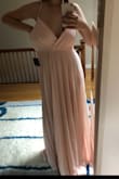 Based on reviews and my regular size I went with a small.

Wayyyy to big. Will be exchanging/ returning. Also has a lot of fabric in the front which can feel heavy - Megan T.