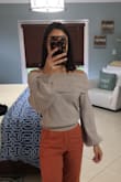 Have been wearing this cute off the shoulder sweater to work and love it. The material is soft to the touch and keeps you warm without overheating you. Could wear it everyday - Melissa L.