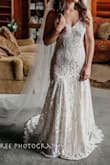 We had to reschedule our wedding due to COVID and my dress wouldn't be ready in time. I bought this dress and it fit perfect besides the length because I'm short. I had a friend shorten it for me so the pleating is different . It was light weight and super comfortable. My shoes had gems on them and it did get caught on them so I just switched my shoes out! Everyone complimented how amazing the dress is and when I told some people the price they were surprised! - Jordan L.