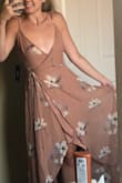 After reading the reviews I decided to size down to an extra small (from my usual small) and the only spot it's a little snug is in the bust. Great material and very flowy. - Tori A.