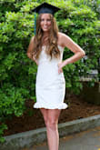 This dress was exactly what I was looking for with my graduation pictures. The white wasn't see through at all and is a great material. I would say it runs a little big, so I would size down if you want it tighter/shorter. - Cathy P.