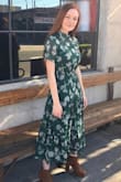I've actually never owned many long dresses before because I'm not super tall so I never thought one would look good on me, but I finally said eff it and bought this one. Super glad I did! I will say that it's definitely longer on me than the model in the photo, it's midi length on her but approaches a maxi length on me, but it's still so beautiful and I constantly get compliments on it! - Julia K.