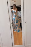 The print and colors are stunning! Since I am so petite, the dress is large on me, but with hemming, it's an easy fix. The satin material and the champagne/blue color combination make the dress look very expensive and fancy. I love it very much! - Nhi N.