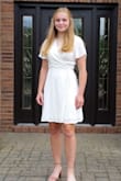 The small fit, but medium gave a little more coverage. lining and material were super nice, wore and received many complements!!! - Meghan W.