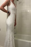 I love this dress! It fits perfect and is good quality. I have been trying for months to find a wedding dress online, and I'm so happy I found the one! It's a little long but that's my only complaint . - Kendra G.