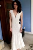 This dress is everything!! I wasn't sure if I'd like this style on me but it hugs all the curves and surprisingly looks good in the bust without any support! The nude underlay helps the lace really stand out which I love. The cap sleeves fit perfect and the back looks amazing too. I couldn't be happier and cannot wait to wear this for my wedding. - Michelle G.