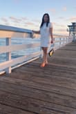 Not see-through at all. White color in size XS is lil loose than Red color size XS, better fitting if I eat something, my stomach is full :) - Annie D.
